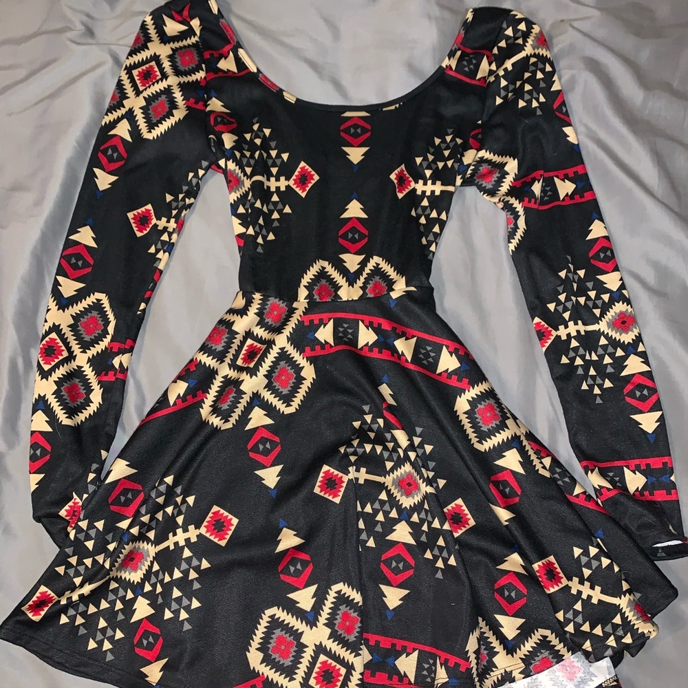 Long sleeved backless dress
